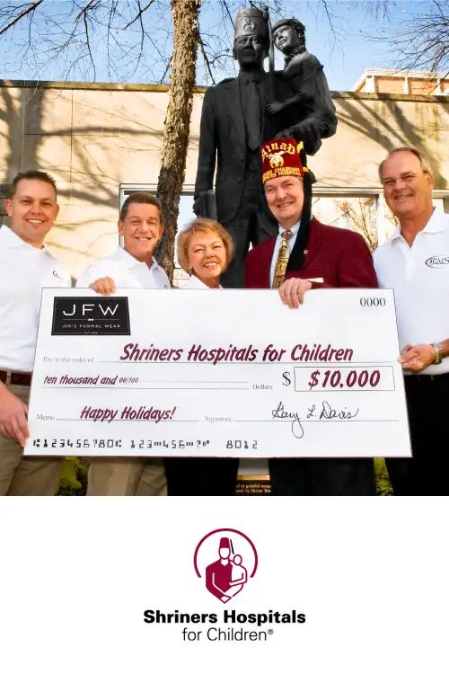 Steve Davis, Gary Davis, June Davis and Tom Barnett of the JFW Family are
      shown presenting a check to Ray Rohr, a Shriners Children’s
      representative.