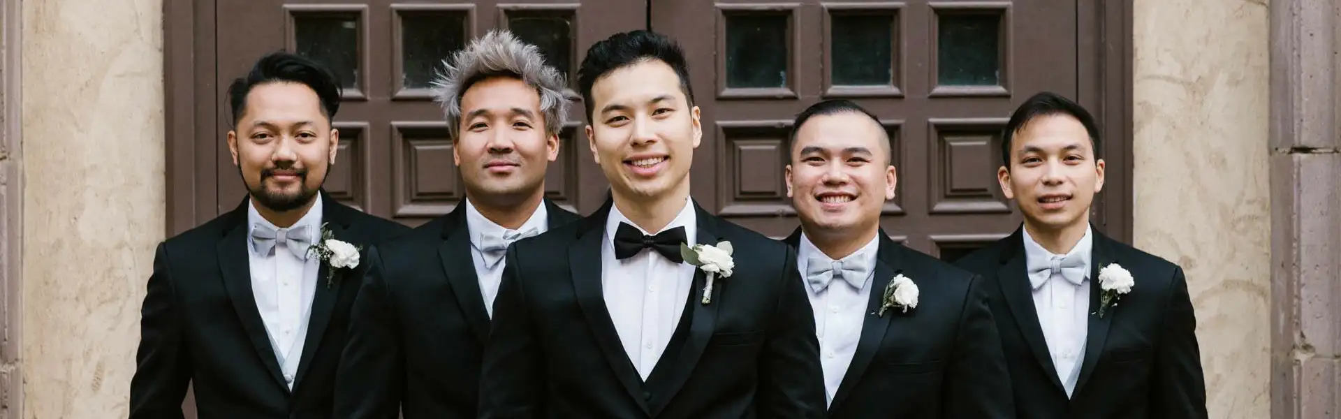 Bridal party in black tuxedos