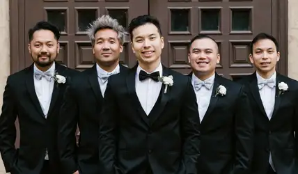 Bridal party in black tuxedos